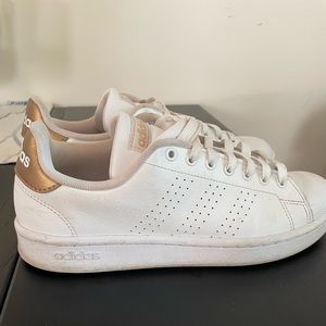 Adidas 8.5 women’s white and gold sneakers.